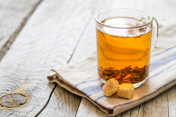 Black tea in glass cup, closeup