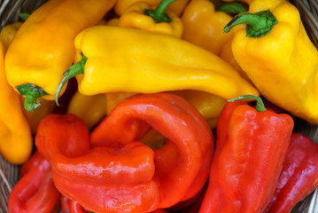 Fresh Yellow and Red Bell Peppers in a Basket