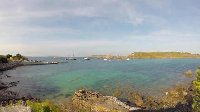 Peaceful time lapse of St Agnus quay with Gugh island behind.