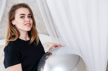 Fototapeta premium fashion portrait of a young girl in studio.