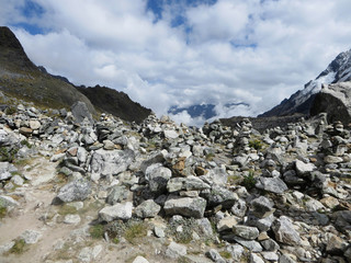 Obraz premium The rocky, remote and majestic terrain of the Salkantay Trek, high in the Andes mountains, on the way to Machu Picchu