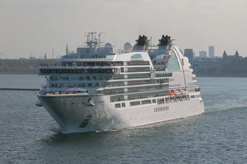 Fototapeta na wymiar Cruise liner leaves port. Copenhagen, Denmark