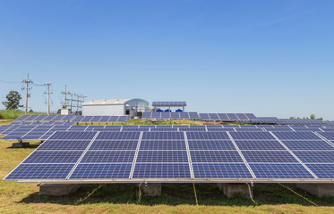 rows array of polycrystalline silicon solar cells or photovoltaics in solar power plant turn up...