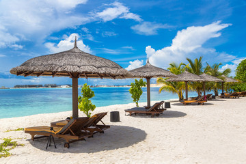 Sunbed and umbrella in the Maldives