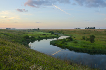 Tranquil summer landscape with river.Twilight.Minutes before the sunrise.River Upa in Tula region,Russia.