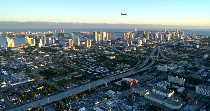 miami plane flyover traffic sunset time