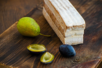 Fruit leather of plums and pears. Russian pastila. Healthy raw vegan snack. Fruit plum strudel cake.