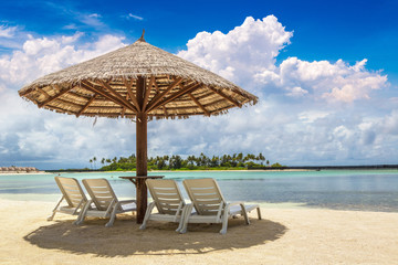 Sunbed and umbrella in the Maldives