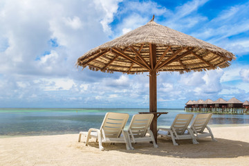 Sunbed and umbrella in the Maldives
