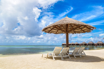 Sunbed and umbrella in the Maldives