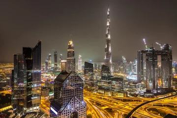 Tuinposter Downtown Dubai at night © Sergii Figurnyi