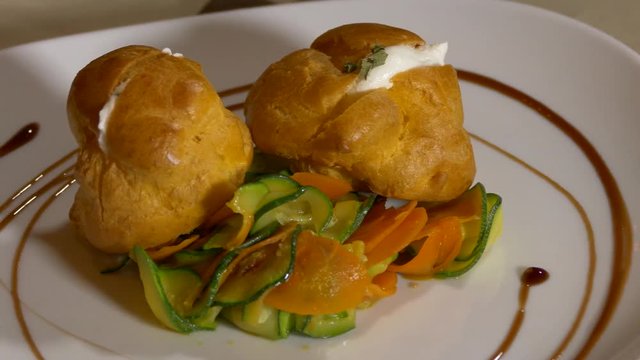Vegetable stuffed bignet with courgettes zucchini and carrots