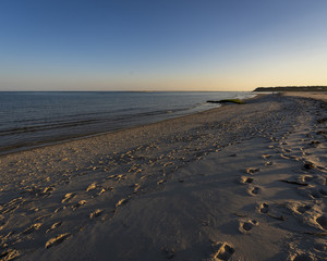 Sunset on Cape cod beach in evening