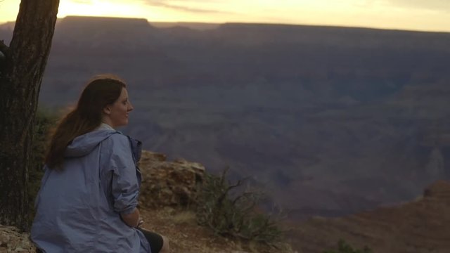 sitting and taking it all in at grand canyon.