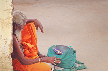 Portrait of Indian Sadhu with Begging Bowl