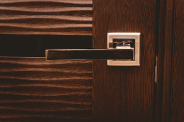 Part brown wooden door with handle modern
