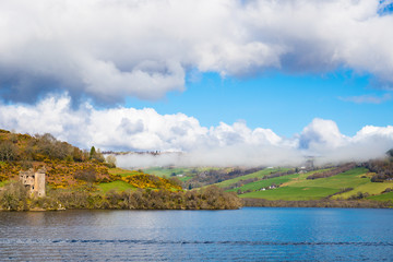 Fototapeta premium Urquhart Castle as seen from Loch Ness lake in the Highlands of Scotland