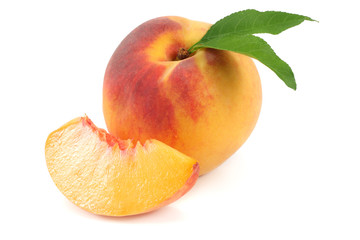 peach fruit with green leaf and slices isolated on white background