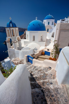 Fototapeta Oia, Santorini. Image of famous cyclades village Oia located at the island of Santorini, South Aegean, Greece.