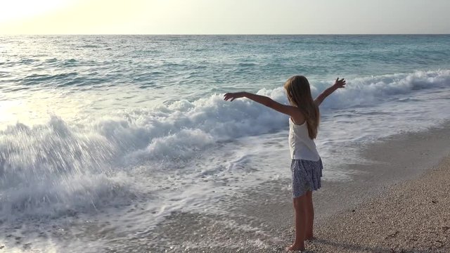 Child Playing on Beach, Girl Looking at Sea Waves, Kid Watching on Seashore