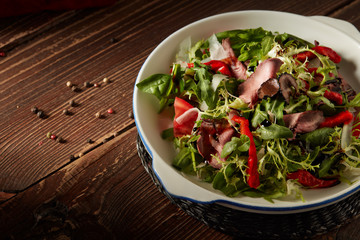 Warm salad with veal.