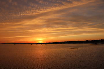 Obraz premium Coucher de soleil sur le bassin d'arcachon