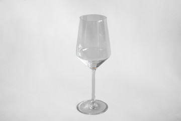 Empty wineglass on a white background 