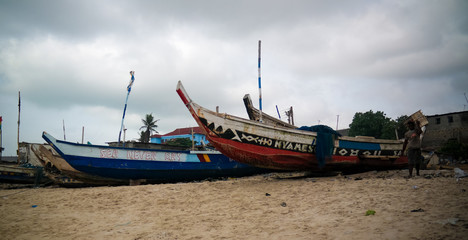 Fototapeta premium Panoramic view to Accra beach with the fishermans boat, Ghana
