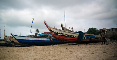Panoramic view to Accra beach with the fishermans boat, Ghana