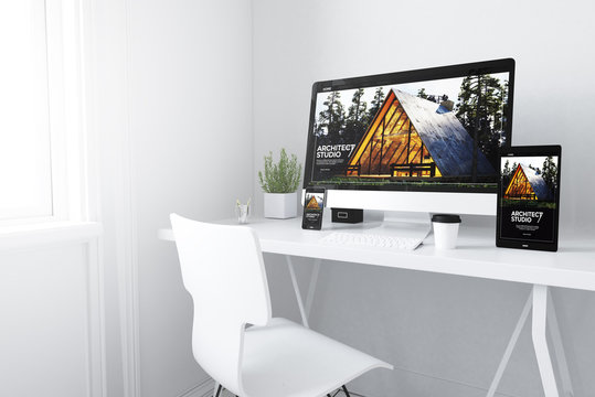  devices on white minimal workspace architect website