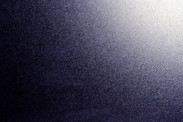 Ground glass texture in blue color with light in corner