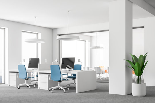 Open space office with blue chairs, minimalism