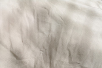 The background is white fabric has a soft ripple,  For web design or graphic art image .