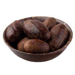 Dry nutmeg spice isolated on a white background