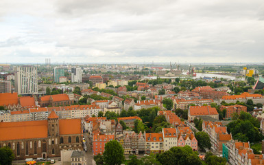 City of Gdansk in Poland, aerial view over the Old Town, from  Saint Mary's Church tower. Cityscape of Gdansk at cloudy day.