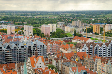 City of Gdansk in Poland, aerial view over the Old Town, view from Saint Mary's Church Tower. Cityscape of Gdansk at cloudy day.