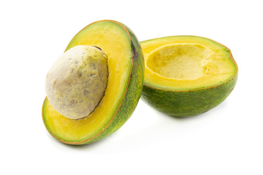 Ripe avocado and Avocado slices isolated on white background