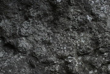Fototapeta na wymiar 黒い岩肌
