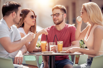 Friends having a great time in cafe