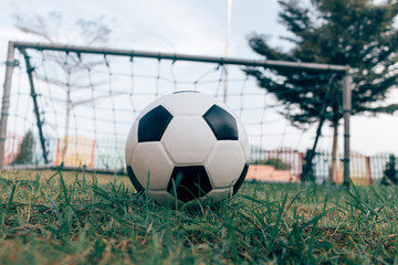 soccer ball on grass vintage tone