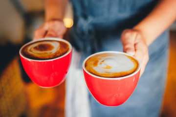 Waitress serving coffe