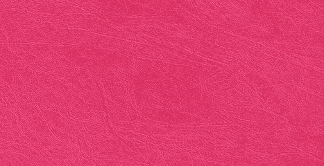 Colored  skin texture, natural or faux pink leather background, closeup.
