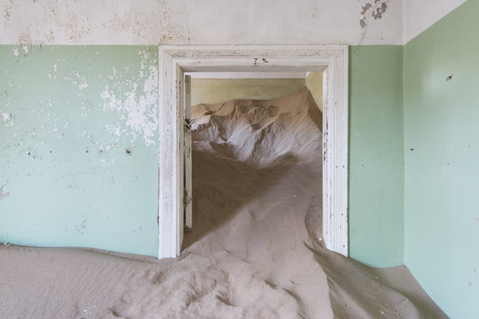 The interior of a building in the abandoned diamond mining ghost town of Kolmanskop, Namibia