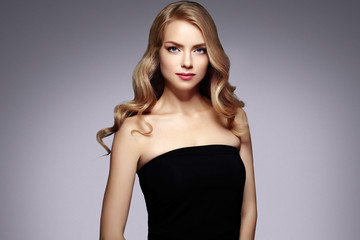 Fototapeta premium Woman with beautiful hairstyle curly blonde hair