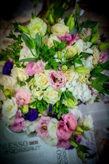 Close-up of groom's hand holding bride's wirst tender, flower, newlywed, church