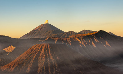 Mount Bromo volcano (Gunung Bromo) during golden hour at Bromo Tengger Semeru National Park, East...