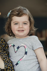 Little Girl Smiling for a Headshot