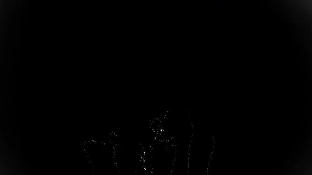 Abstract water falling in slow motion in a black background