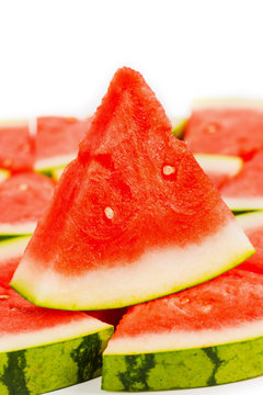 Sliced red watermelon isolated on white.