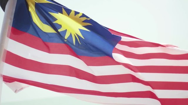 Close Up Shot Of A Waving And Fluttering National Flag Of Malaysia